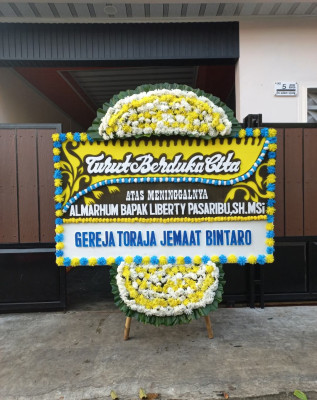 Papan Bunga Duka di Panai Hulu